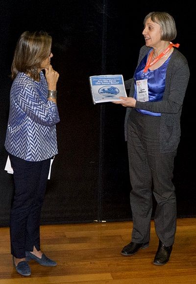 Fernanda Rollo (Secretary of State for Science and Higher Education) receiving the report 'Are We All In The Same Boat' from Lynda Hardman at the opening ceremony